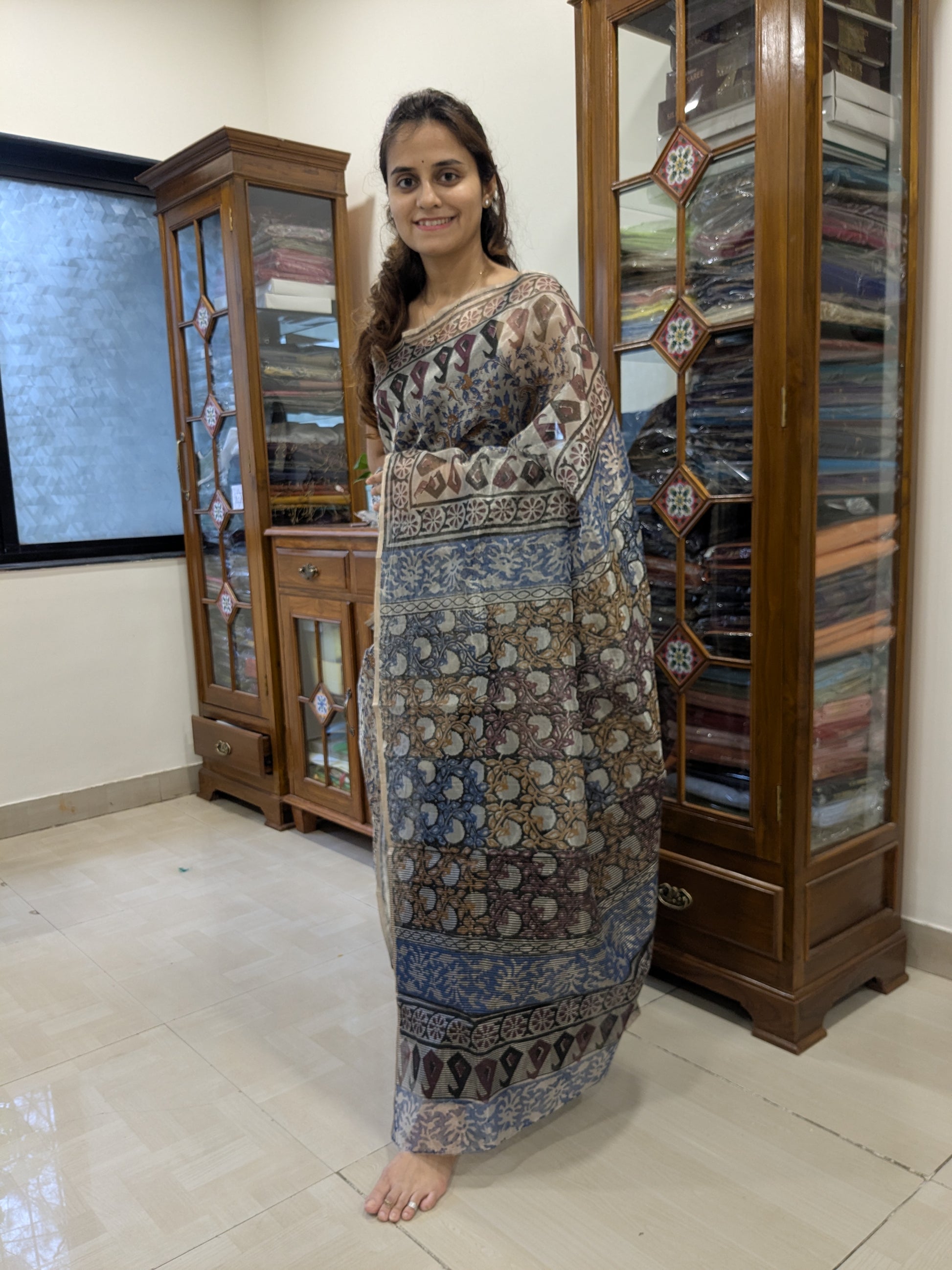 Front view capturing the elegant color blend and sheer texture of 100% pure Chanderi silk.