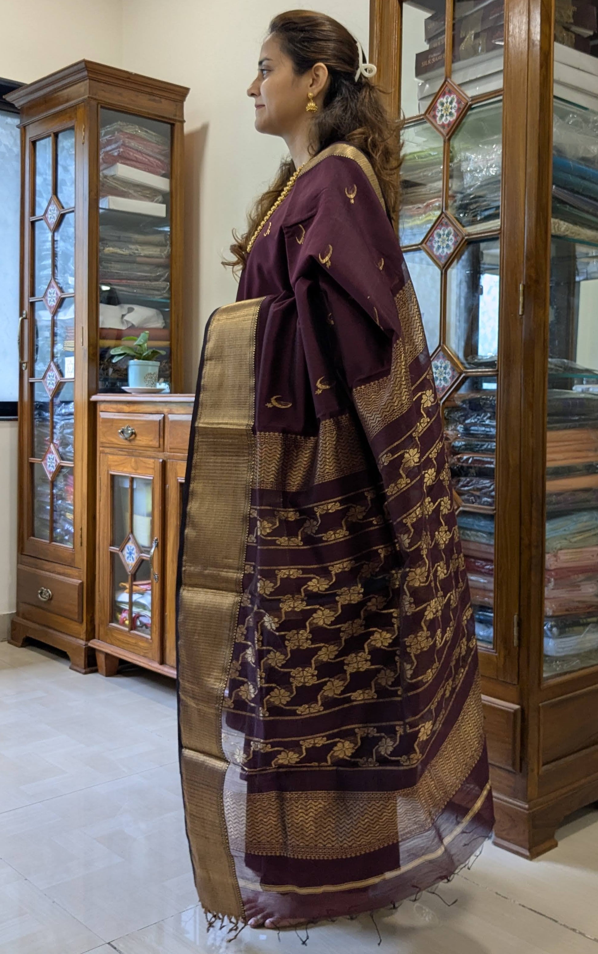 Side profile showing soft drape with wide and narrow handwoven borders.