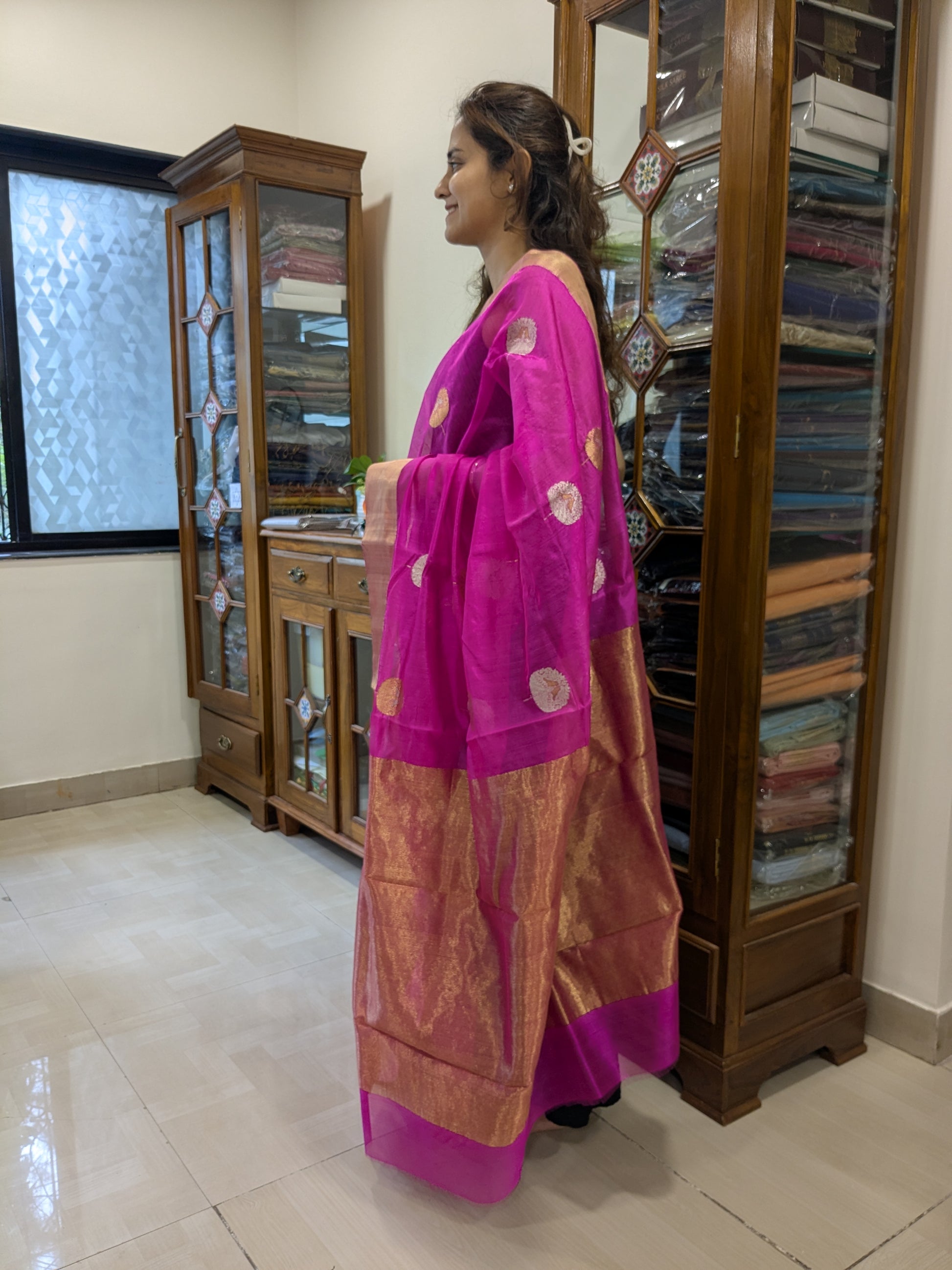 Side view showcasing the graceful drape and fine silk texture.