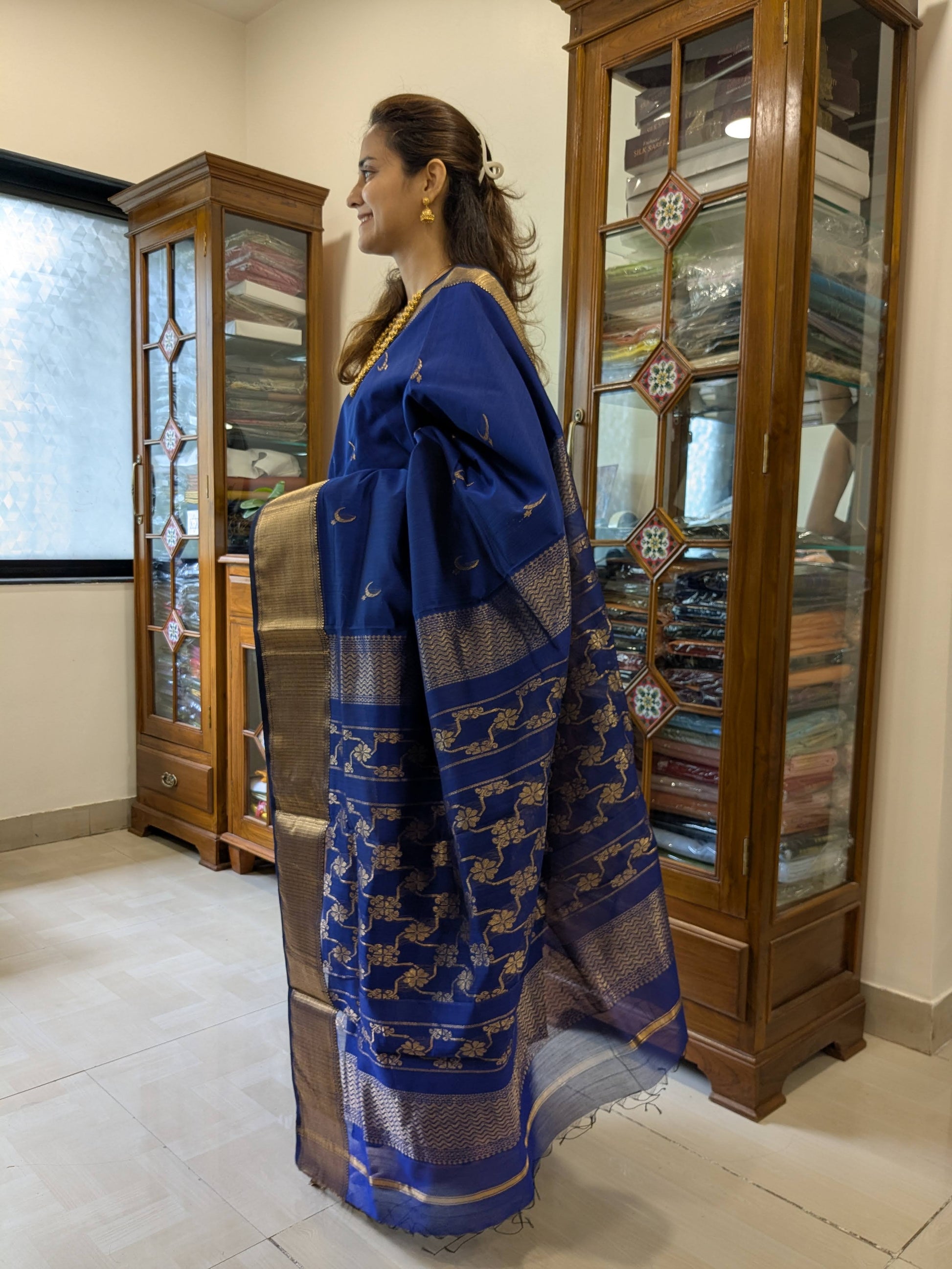 Side view highlighting the fluid drape and distinctive wide-narrow borders.