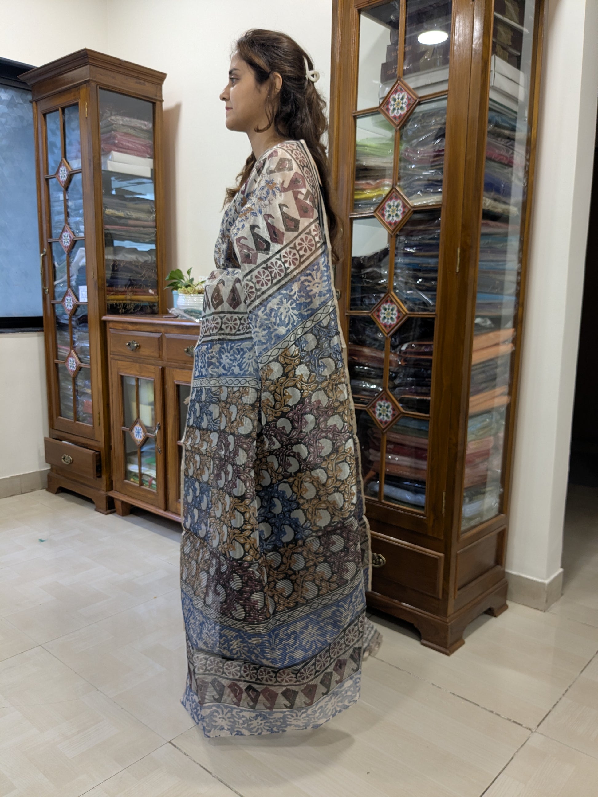 Side view showcasing the soft fall and lightweight grace of the saree.