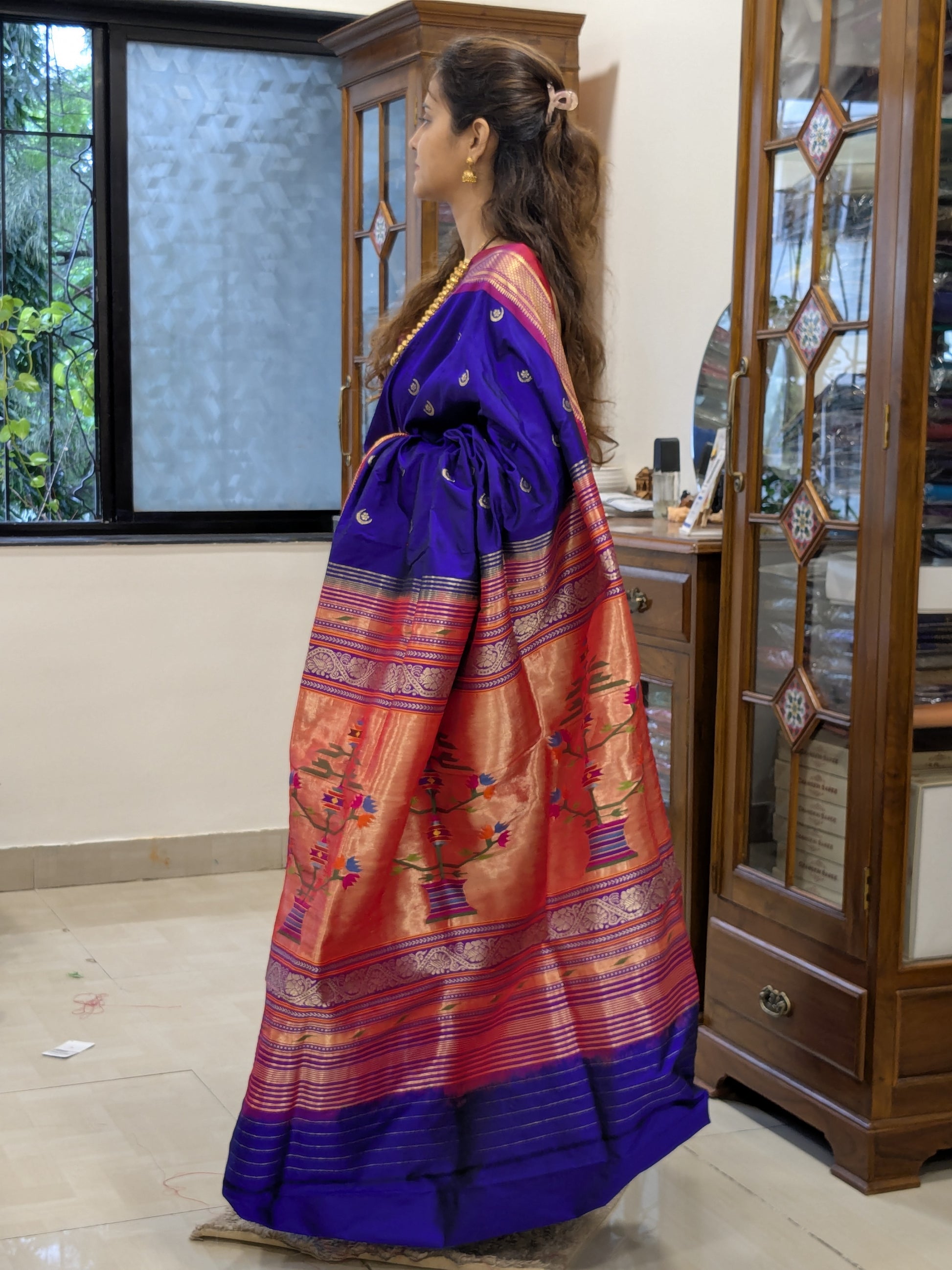 Side view highlighting fluid drape and luxurious silk sheen.