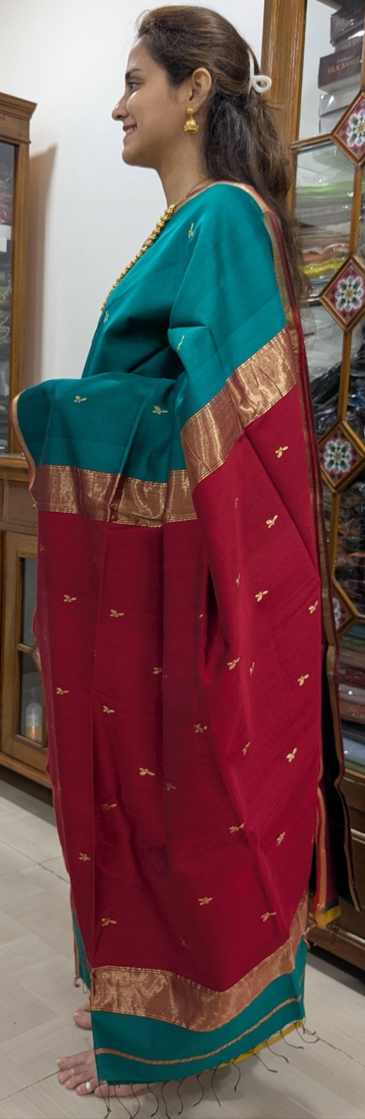 Side view highlighting the light drape, smooth texture, and subtle leaf butti design.