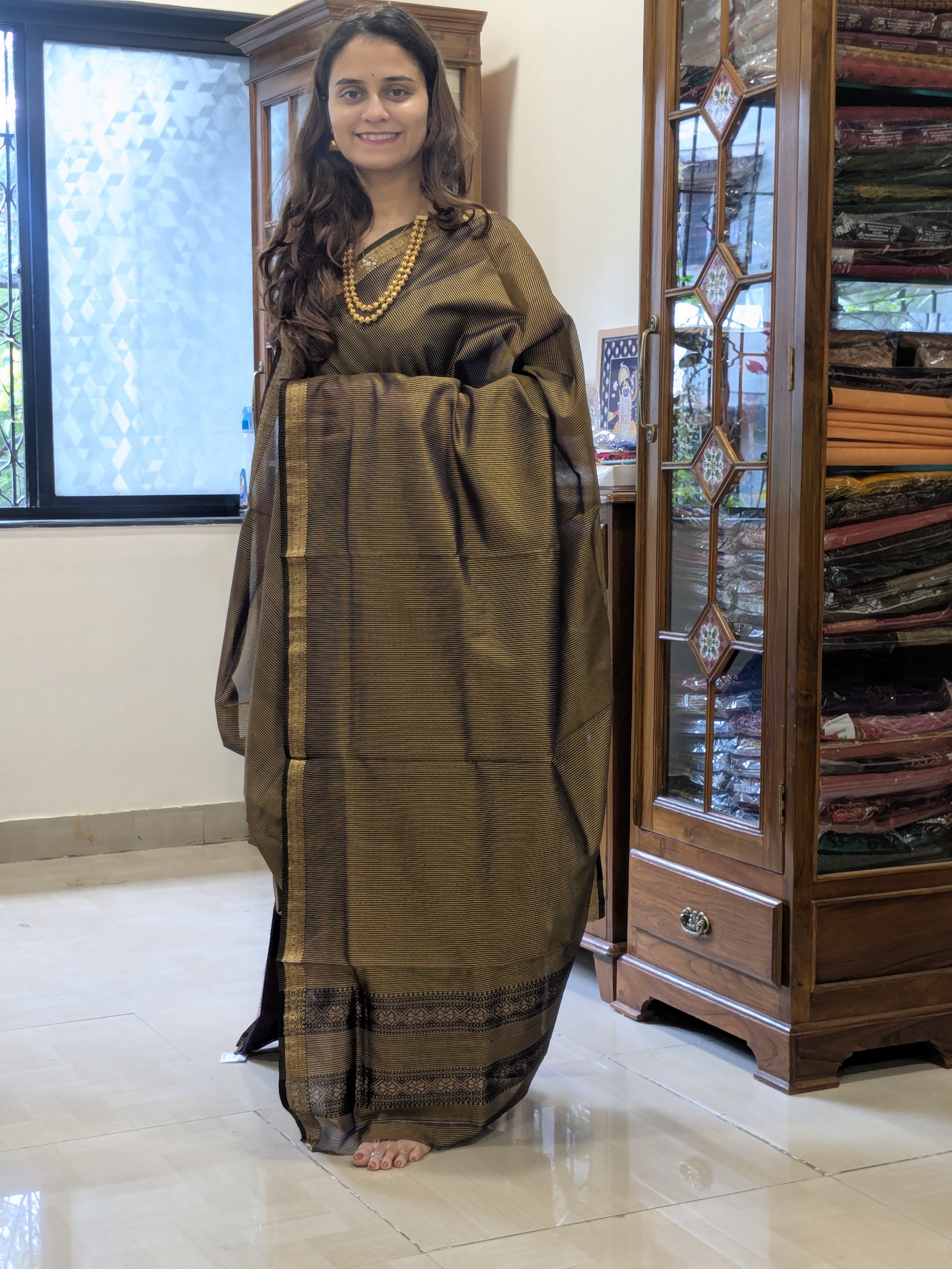 Garbh Reshmi Black and Golden Maheshwari Saree