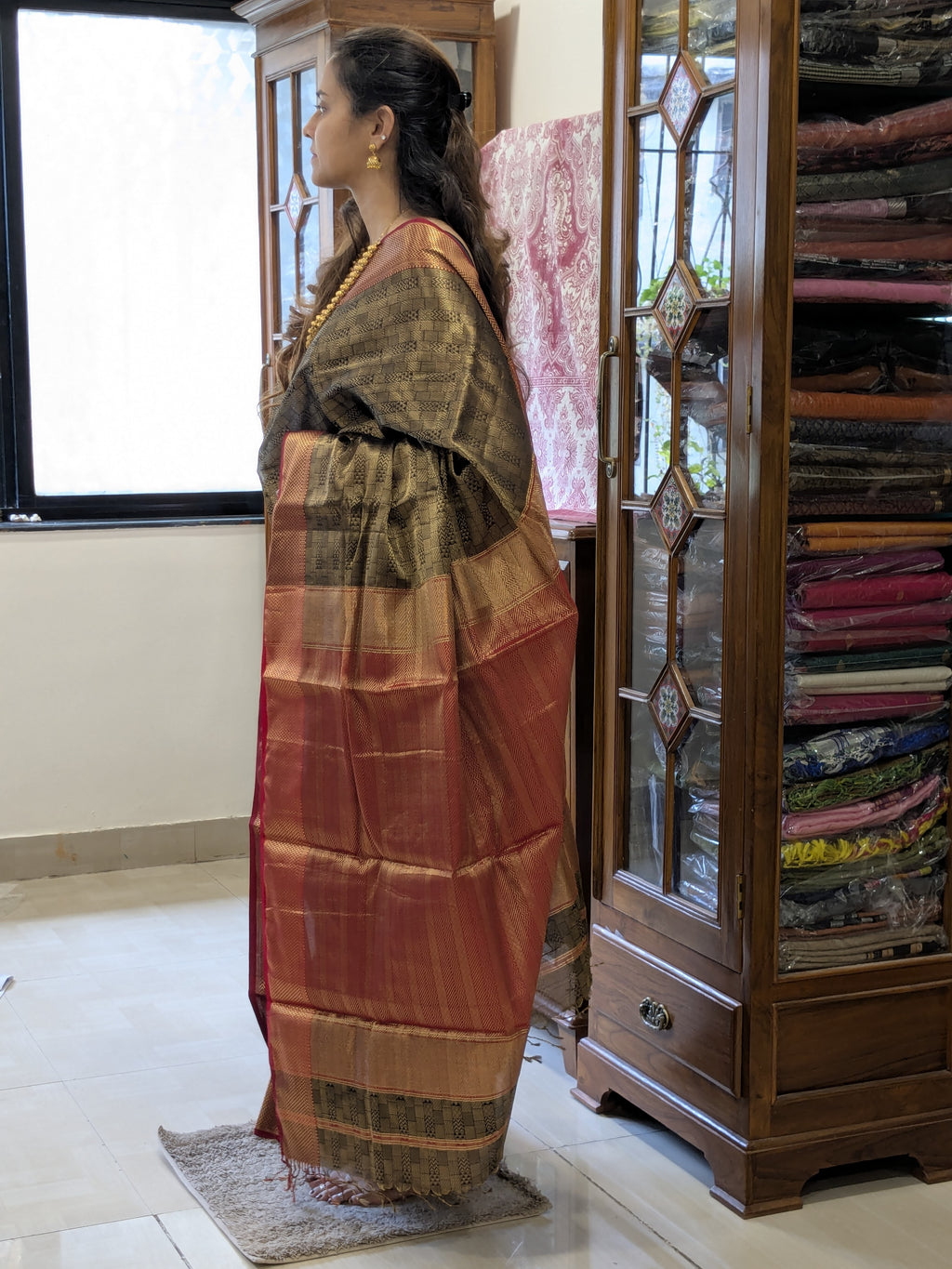 Maheshwari Handloom Black and Gold Tissue Saree with Red Pallu