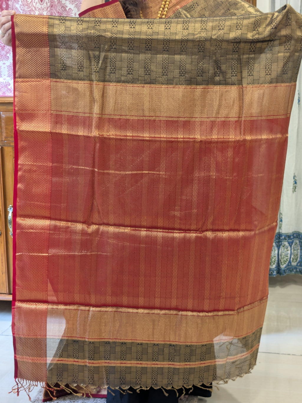 Maheshwari Handloom Black and Gold Tissue Saree with Red Pallu