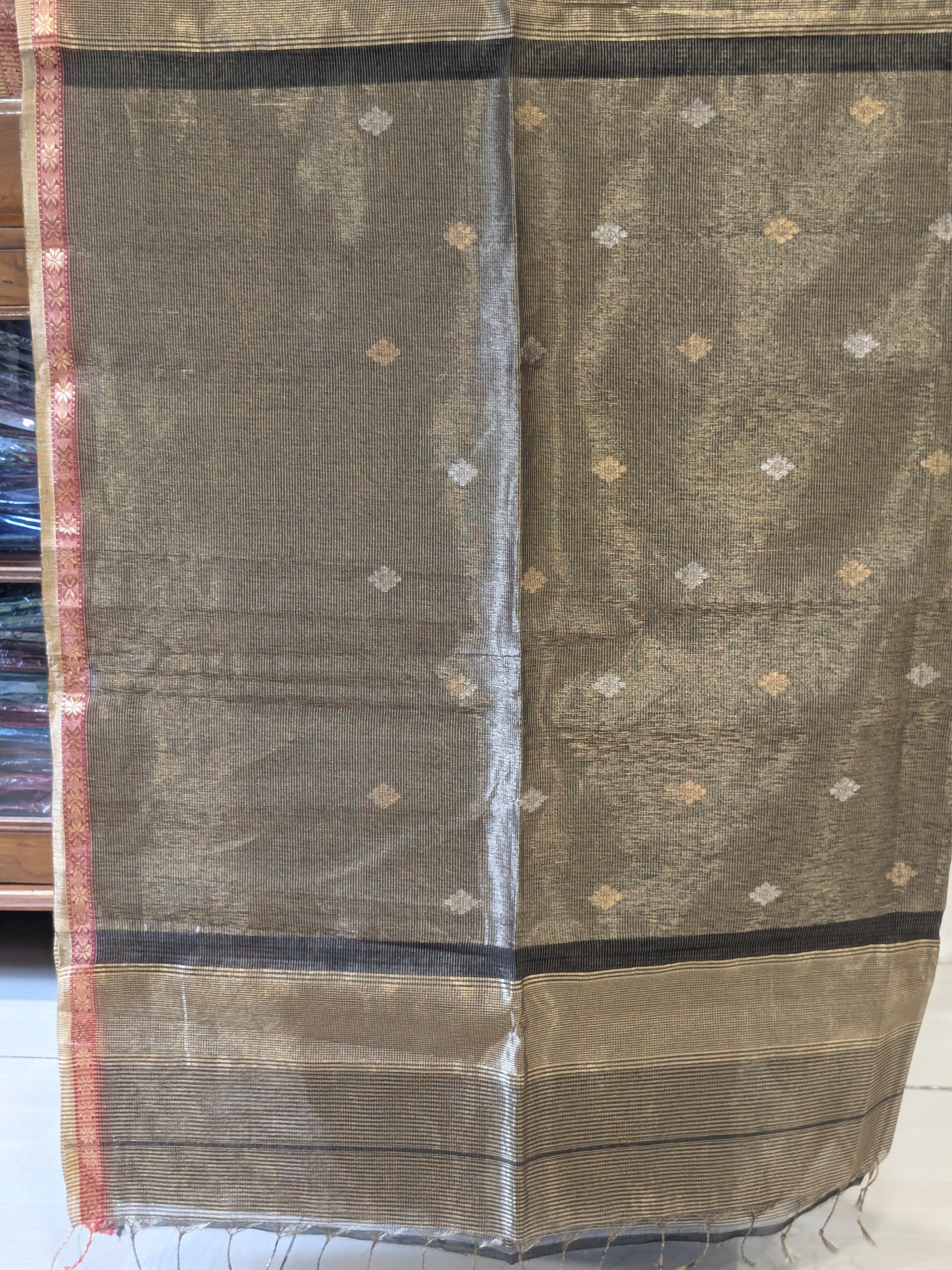 Maheshwari Handloom Black and Gold Tissue Saree