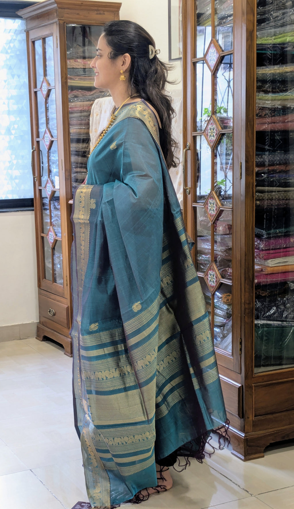 Bluish Green Kanjeevaram Silk Cotton Saree with Mor Buttis & Zari Pallu