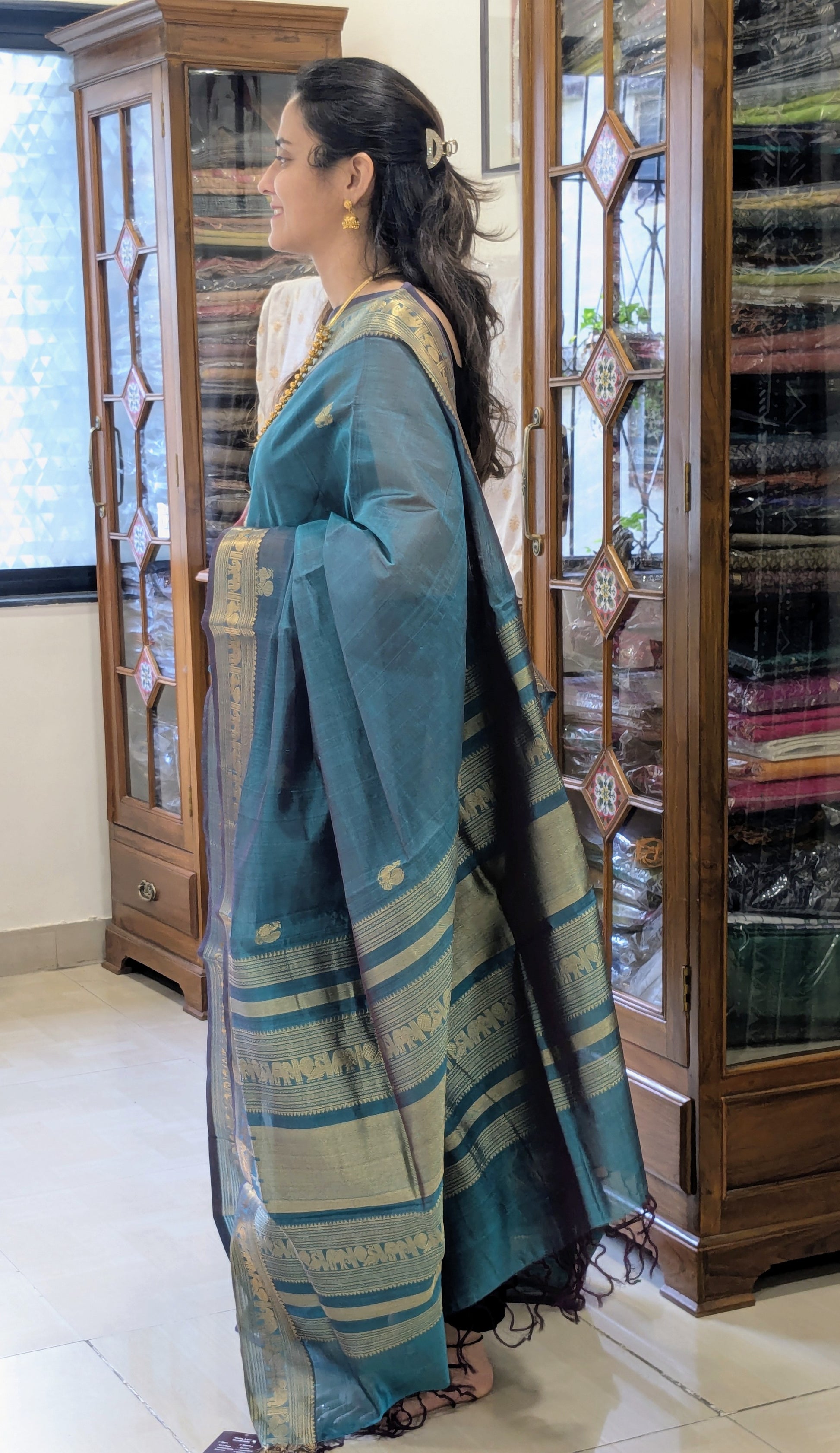 Bluish Green Kanjeevaram Silk Cotton Saree with Mor Buttis & Zari Pallu