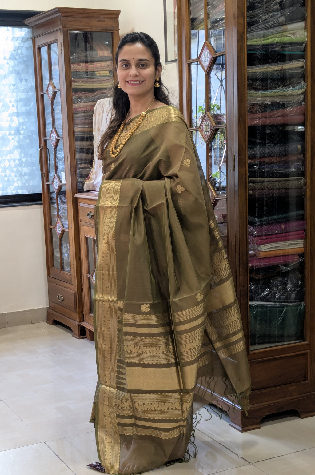 Olive Green Kanjeevaram Silk Cotton Saree with Zari Pallu