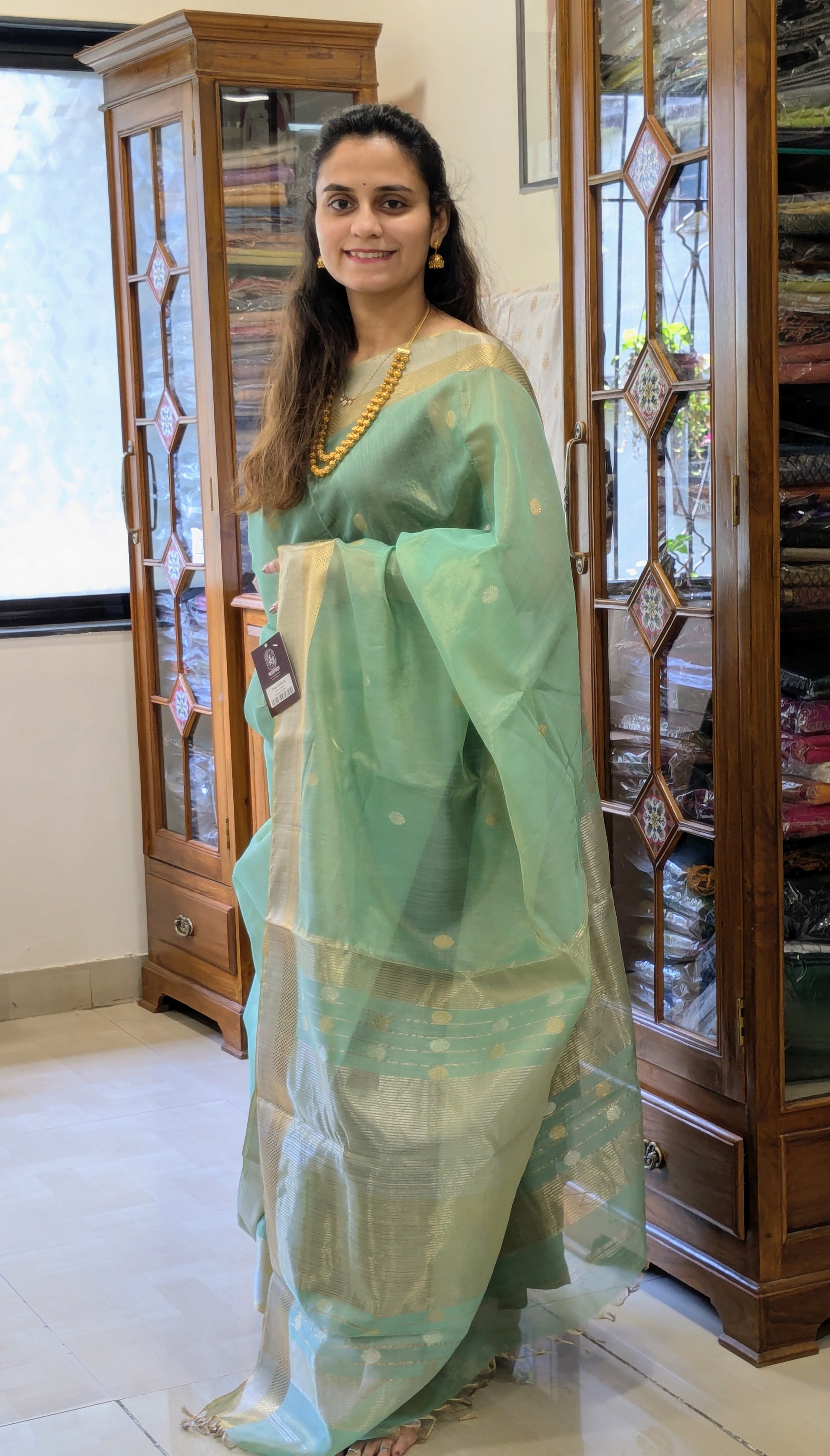 Green Silk Tissue Maheshwari Saree with Silver-Gold Buttis