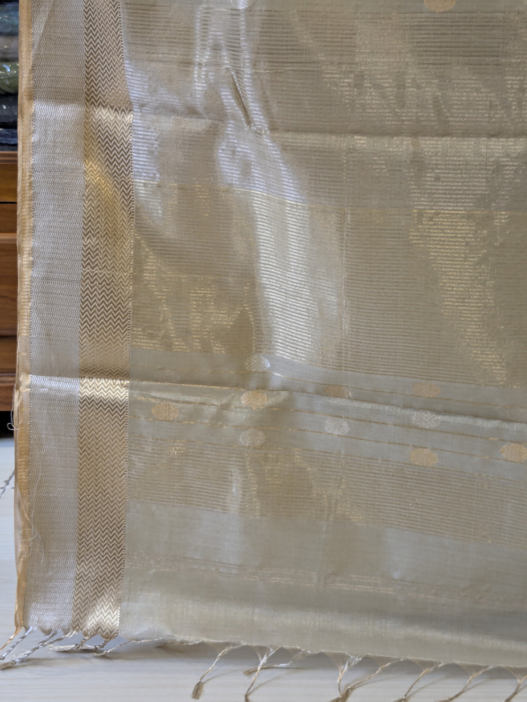 Beige Silk Tissue Maheshwari Saree with Silver-Gold Buttis