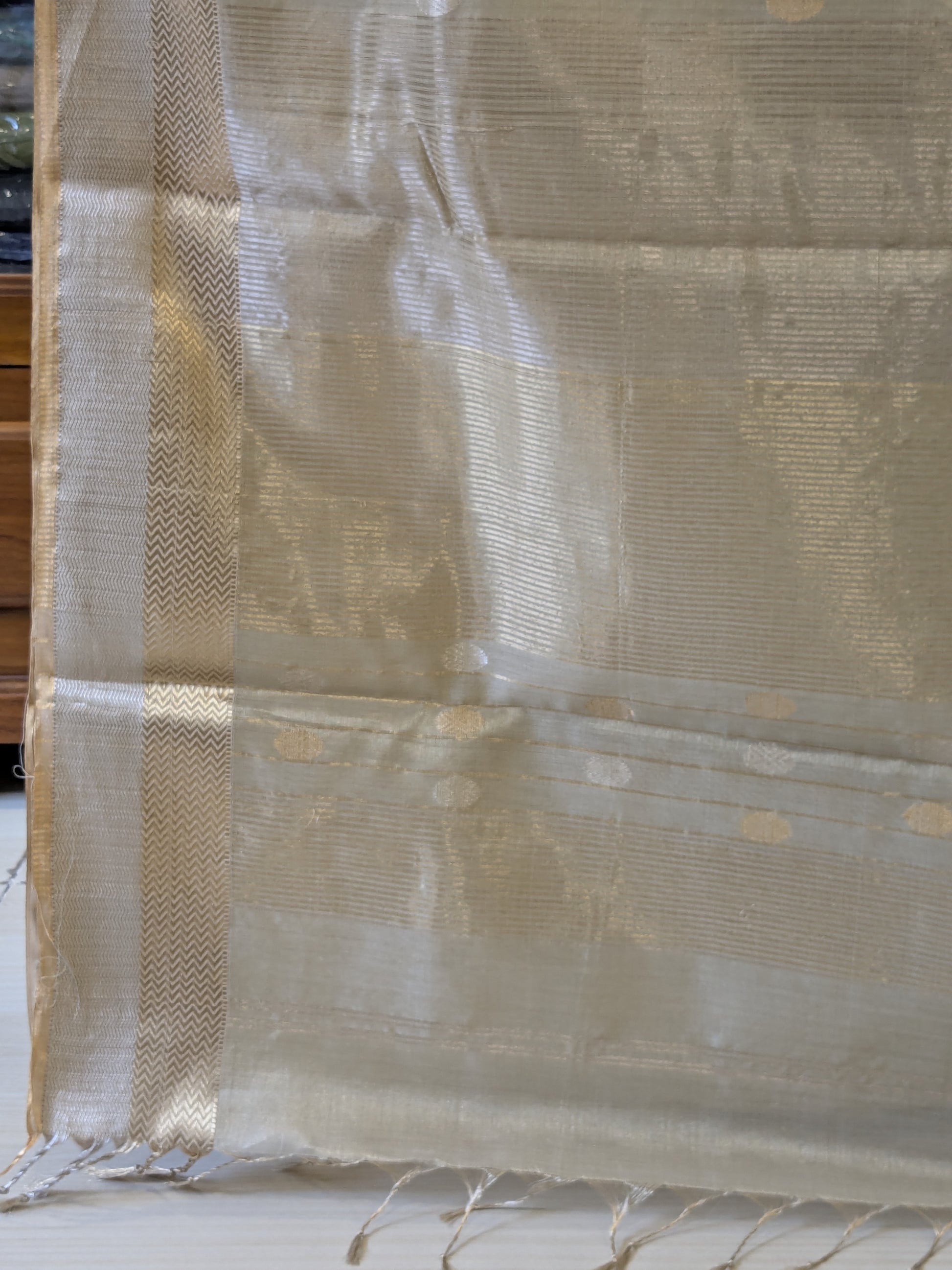 Beige Silk Tissue Maheshwari Saree with Silver-Gold Buttis