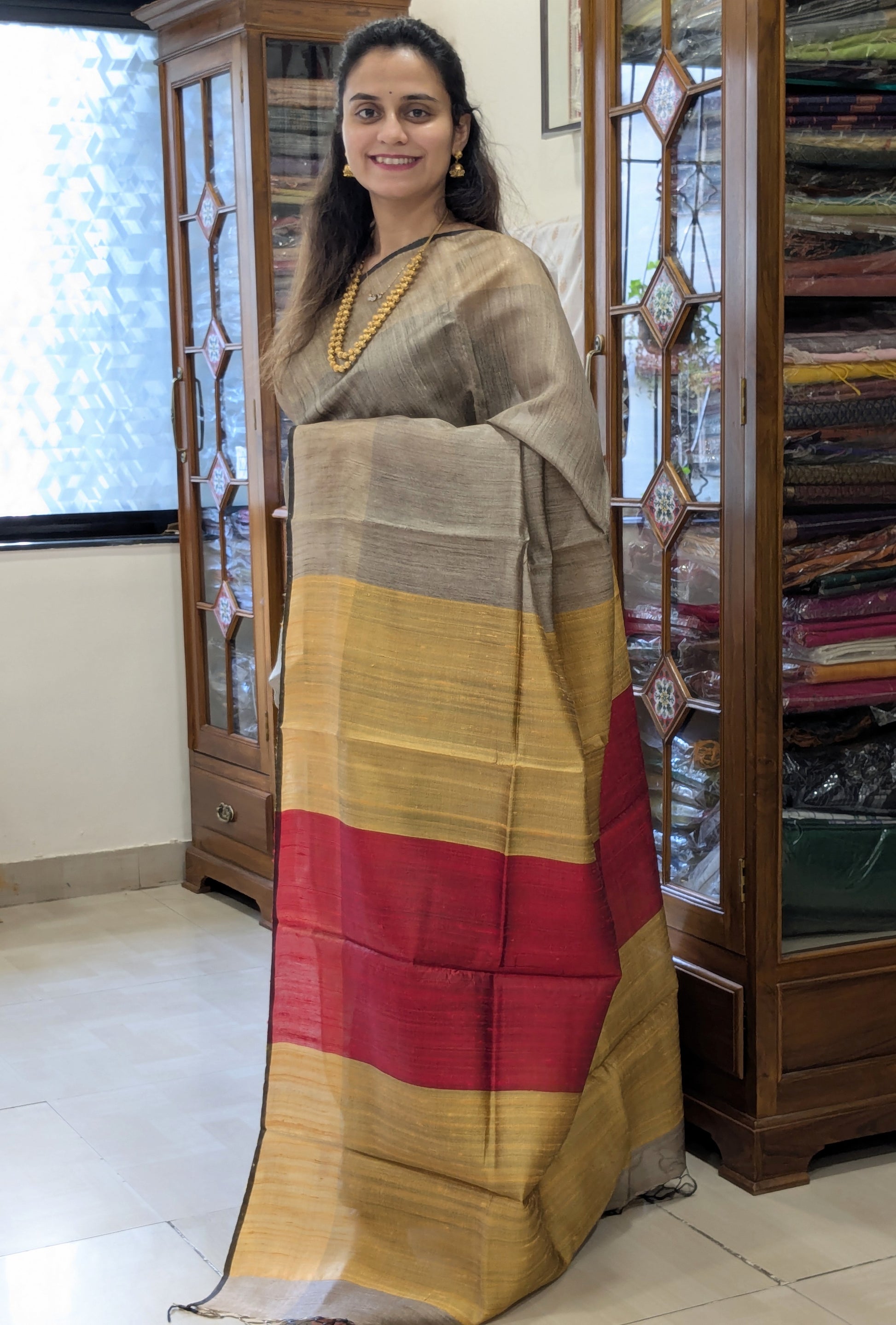Beige Raw Silk Handloom Saree with Yellow and Red Pallu