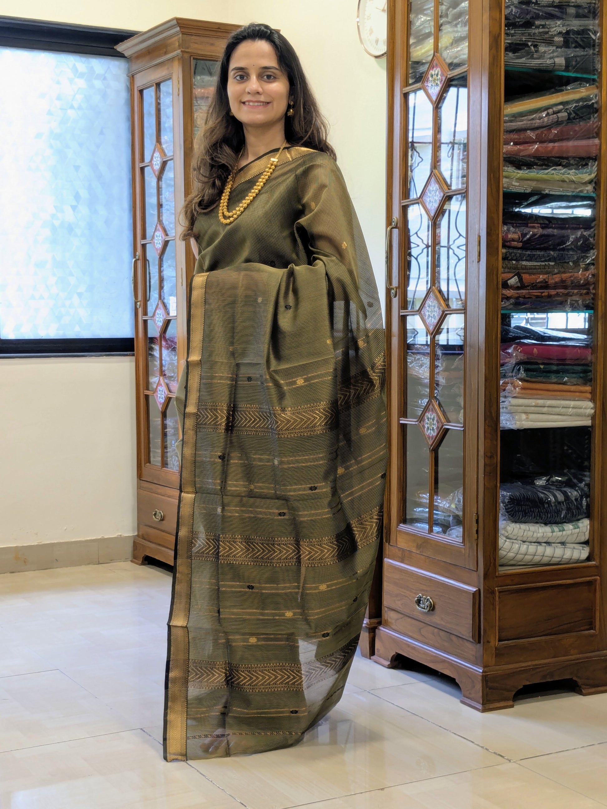 Garbh Reshmi with Butti Mehendi Green Maheshwari Handloom Saree