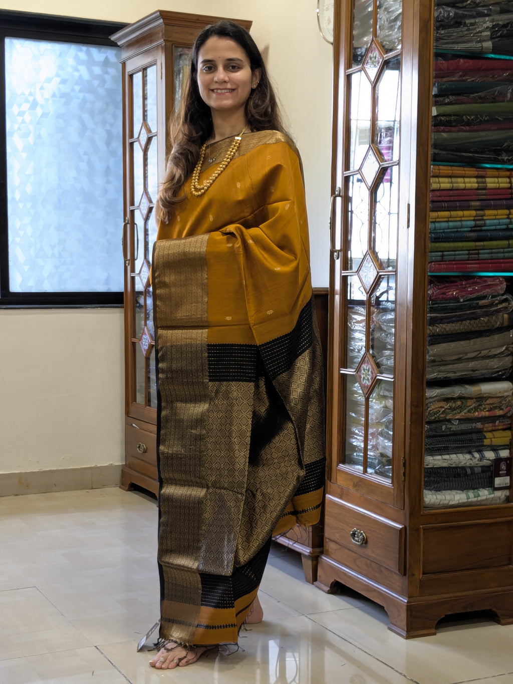 Rust Orange Maheshwari Silk Cotton Saree with Black Heavy Pallu
