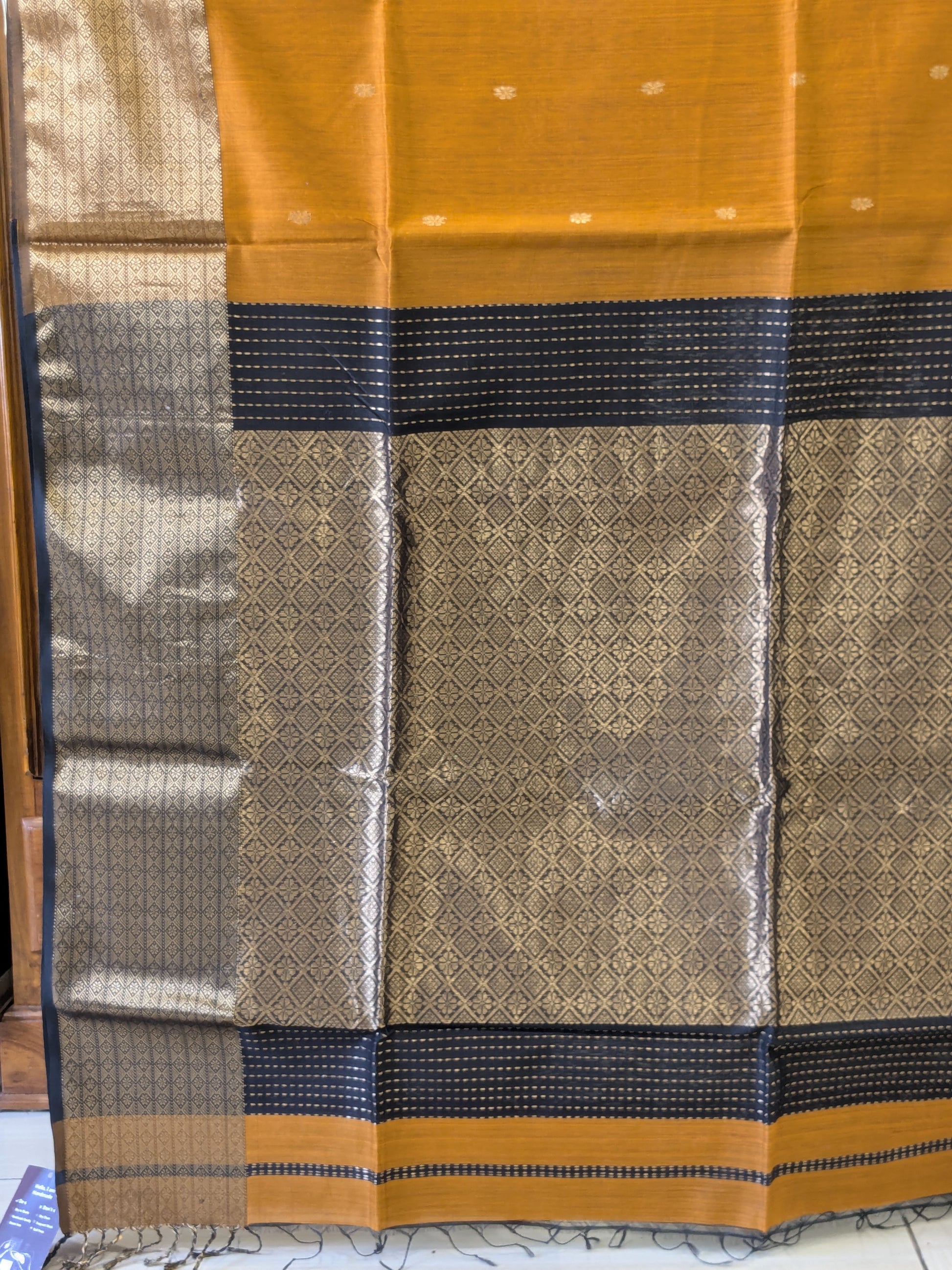 Rust Orange Maheshwari Silk Cotton Saree with Black Heavy Pallu