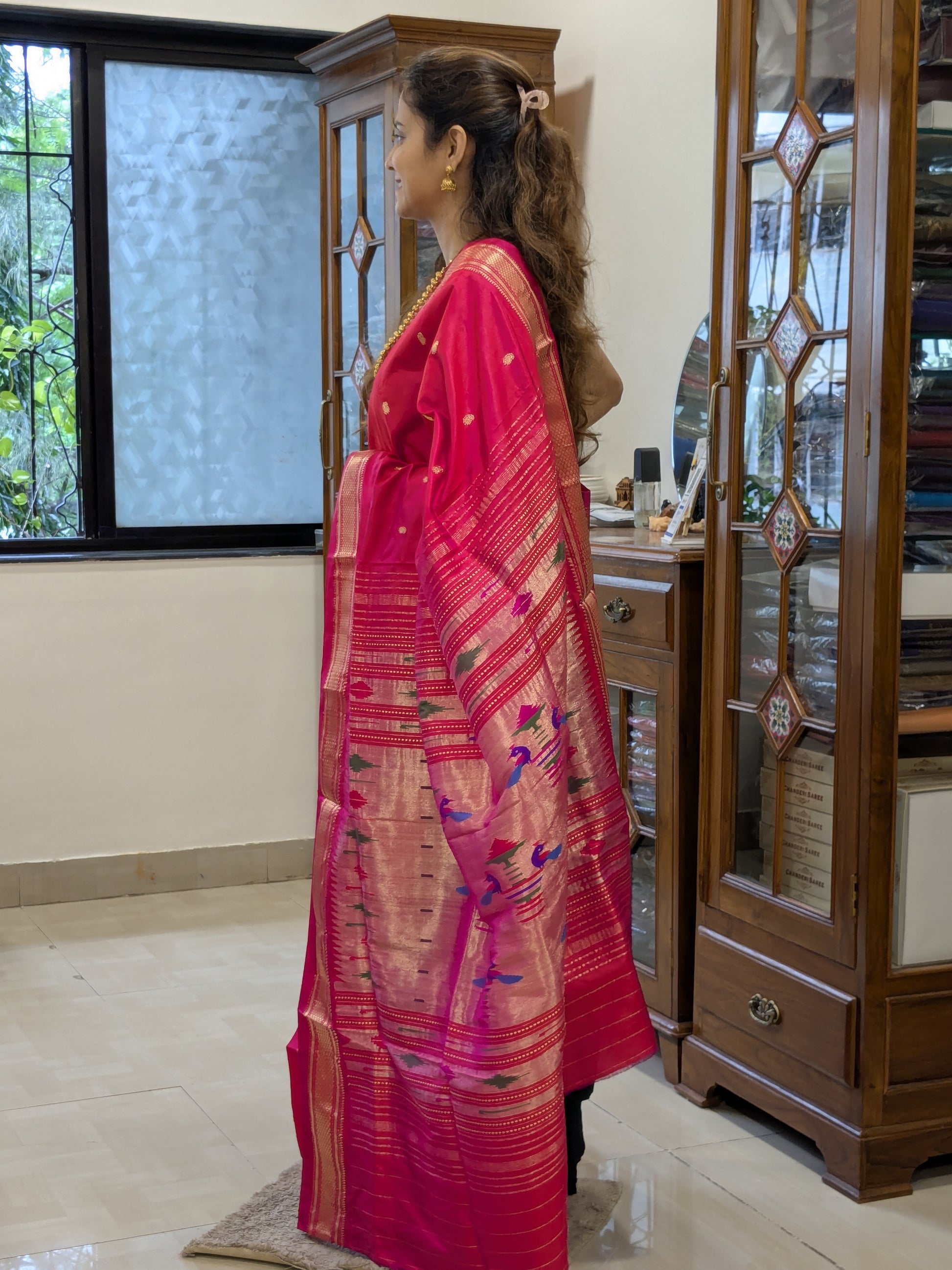 Zoomed-in shot of the handwoven Narali border paired with the vibrant body in pure silk.