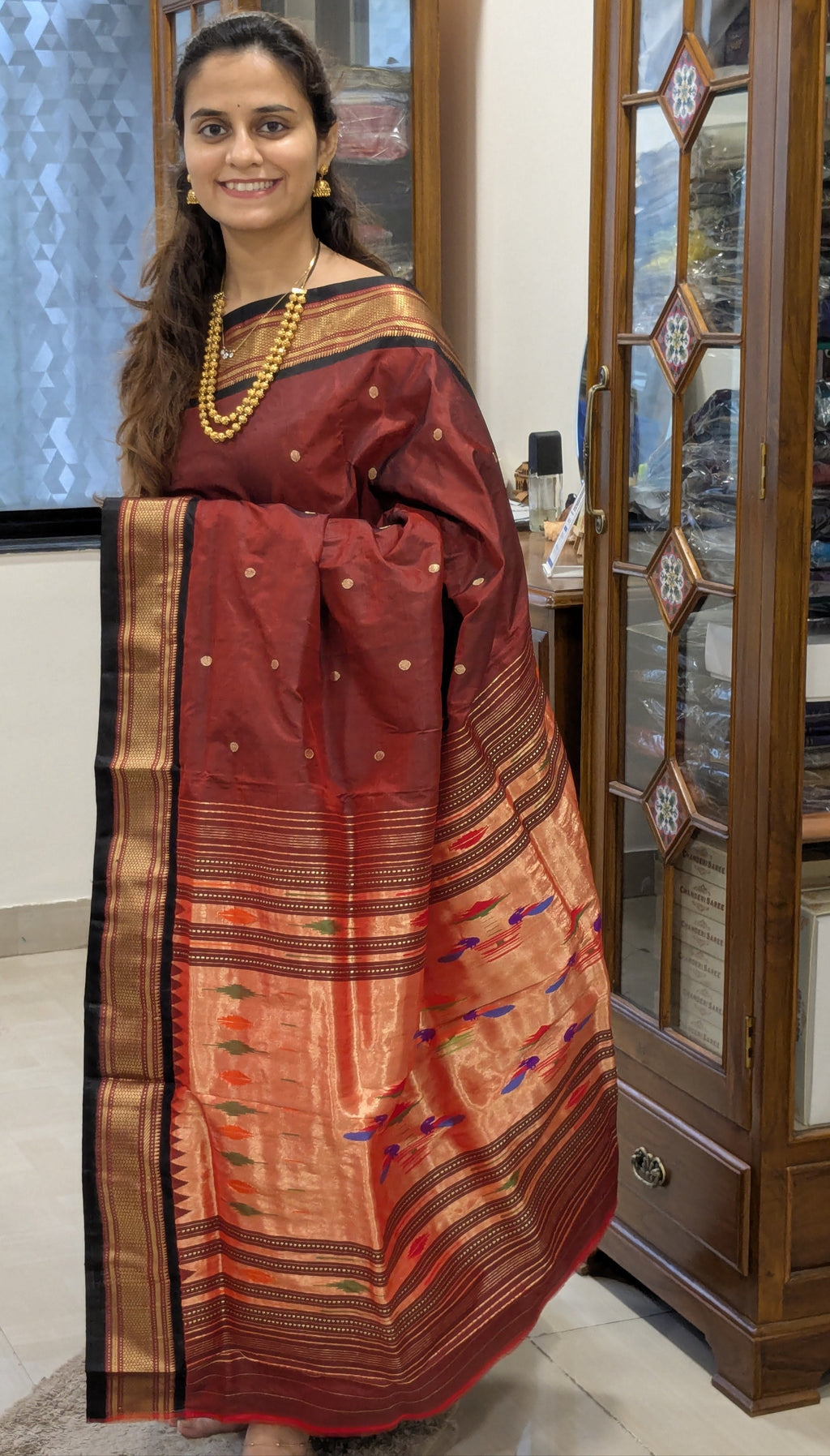 Full front view of elegant brown Paithani saree reflecting bridal charm and rich festive appeal.