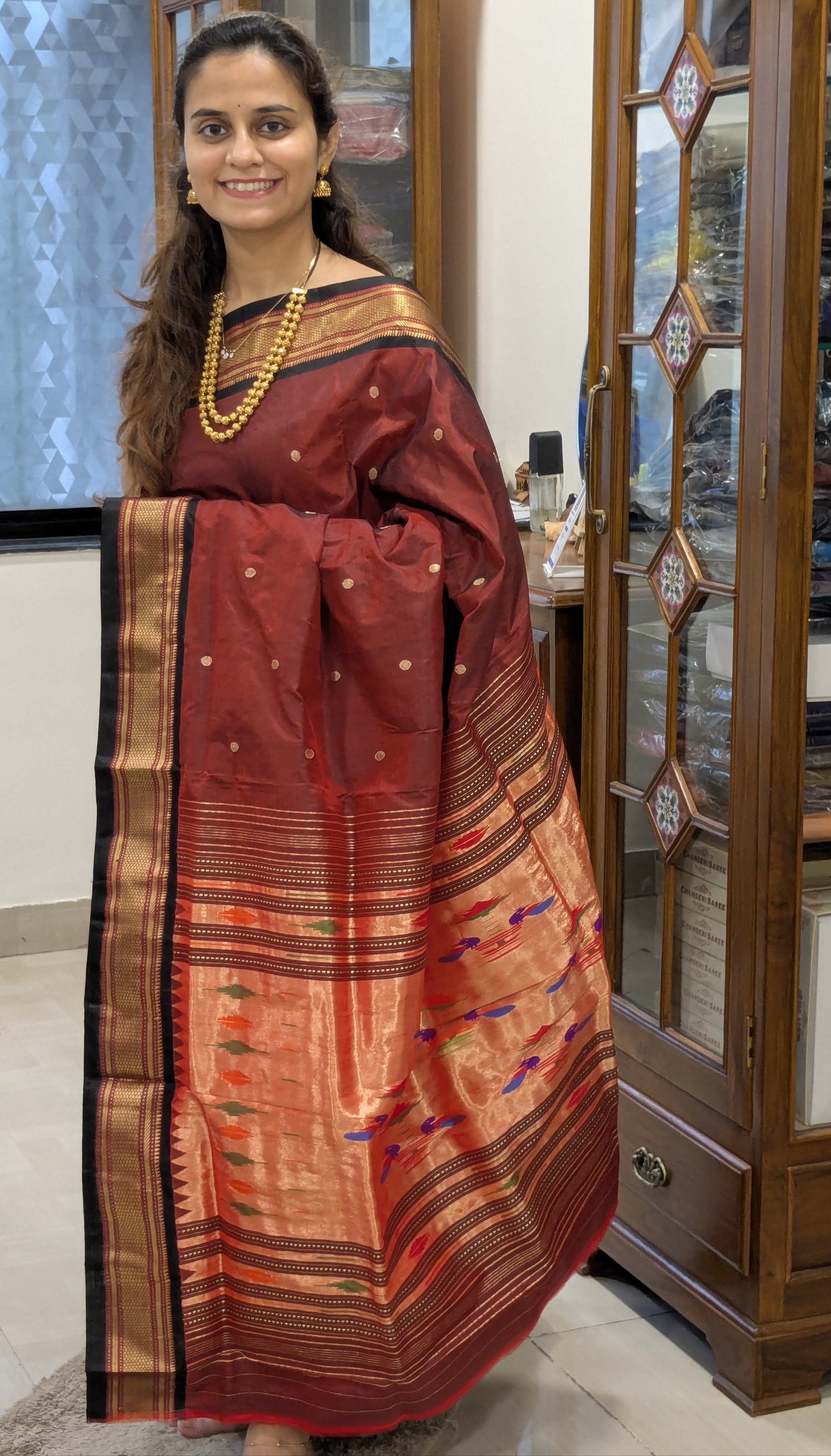Full front view of elegant brown Paithani saree reflecting bridal charm and rich festive appeal.