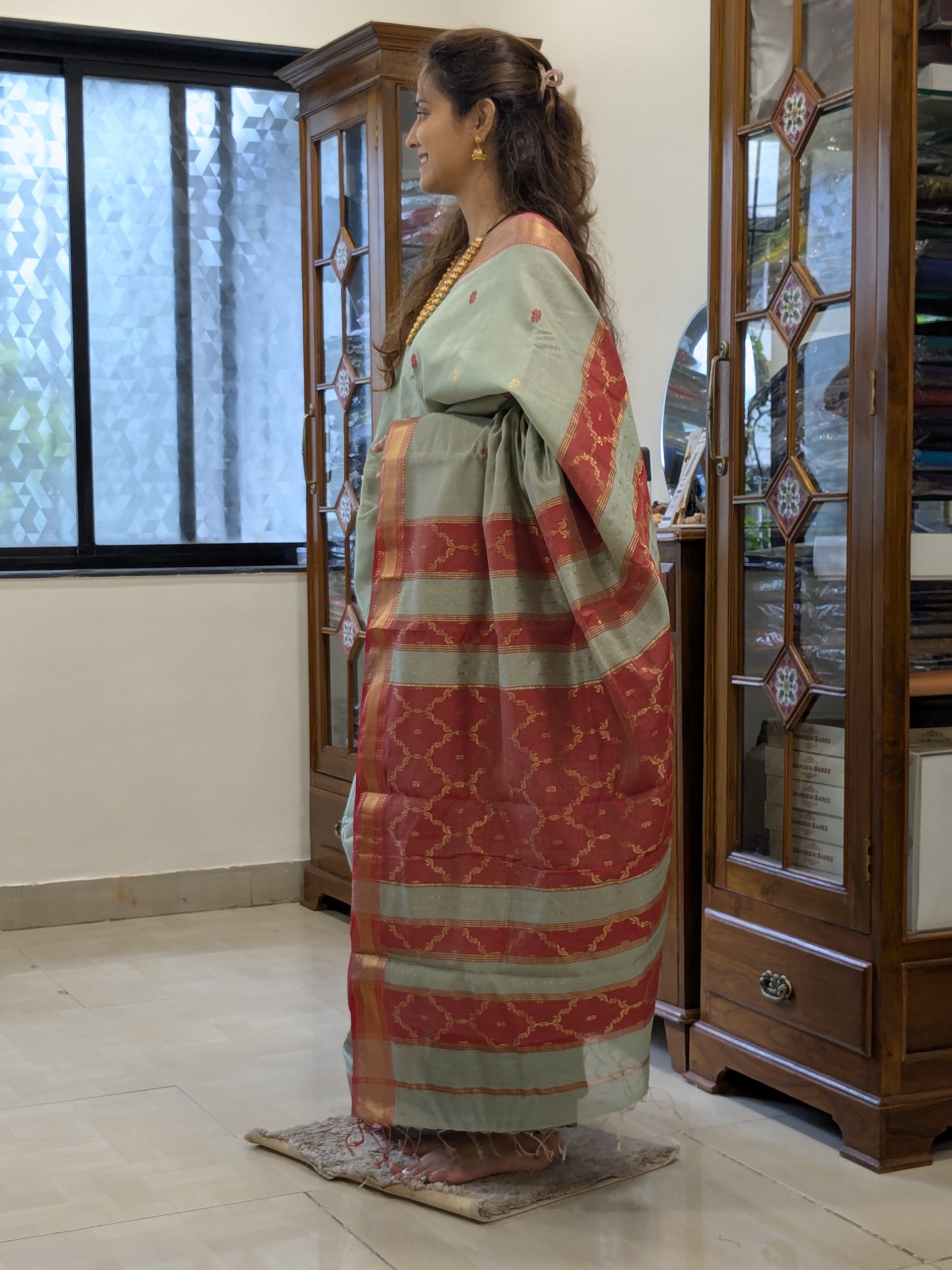 Side view showing texture, handloom finish, and refined floral motifs.