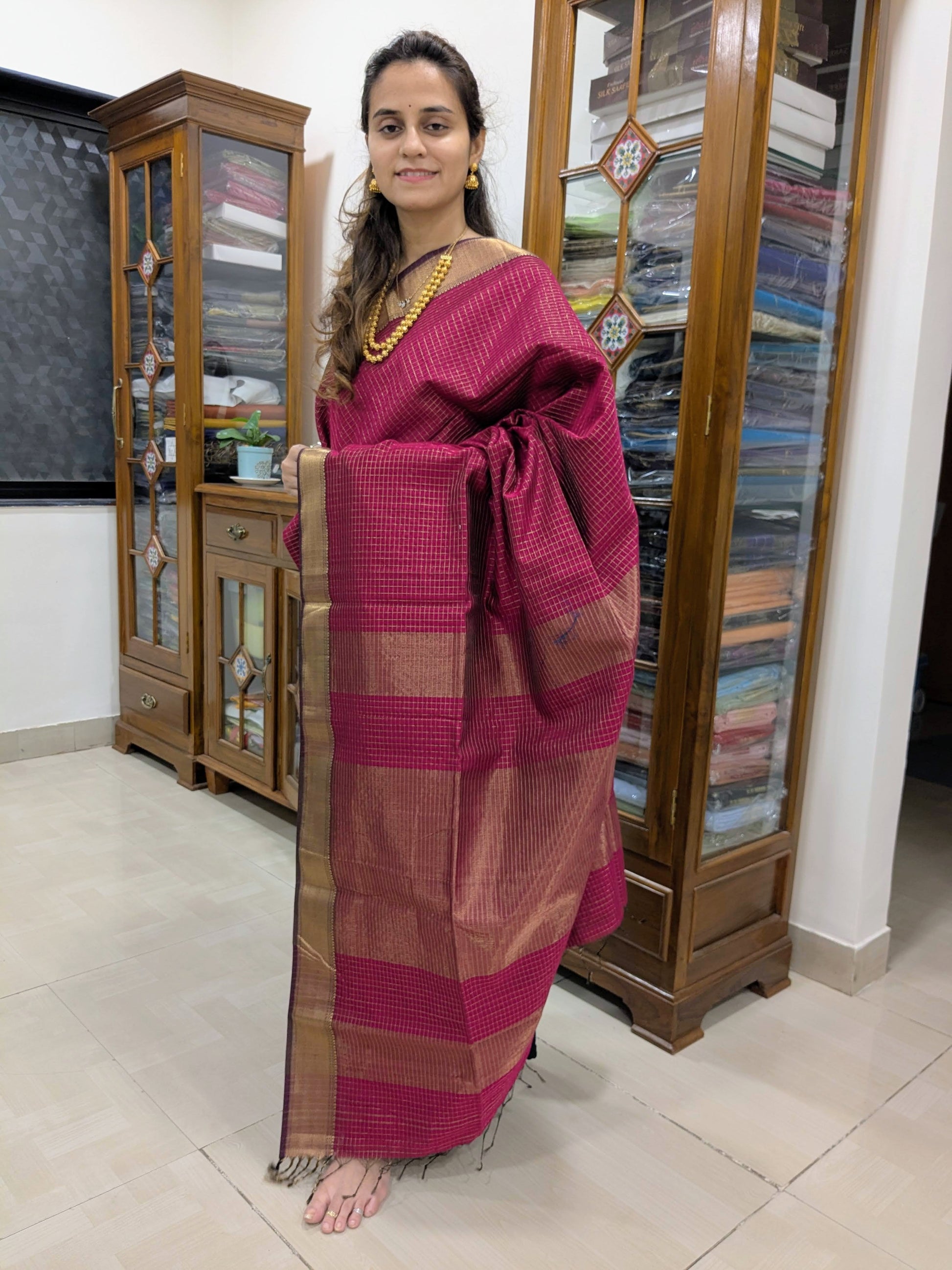 Full front view of vibrant Hot Pink saree exuding festive charm and Maheshwari elegance.
