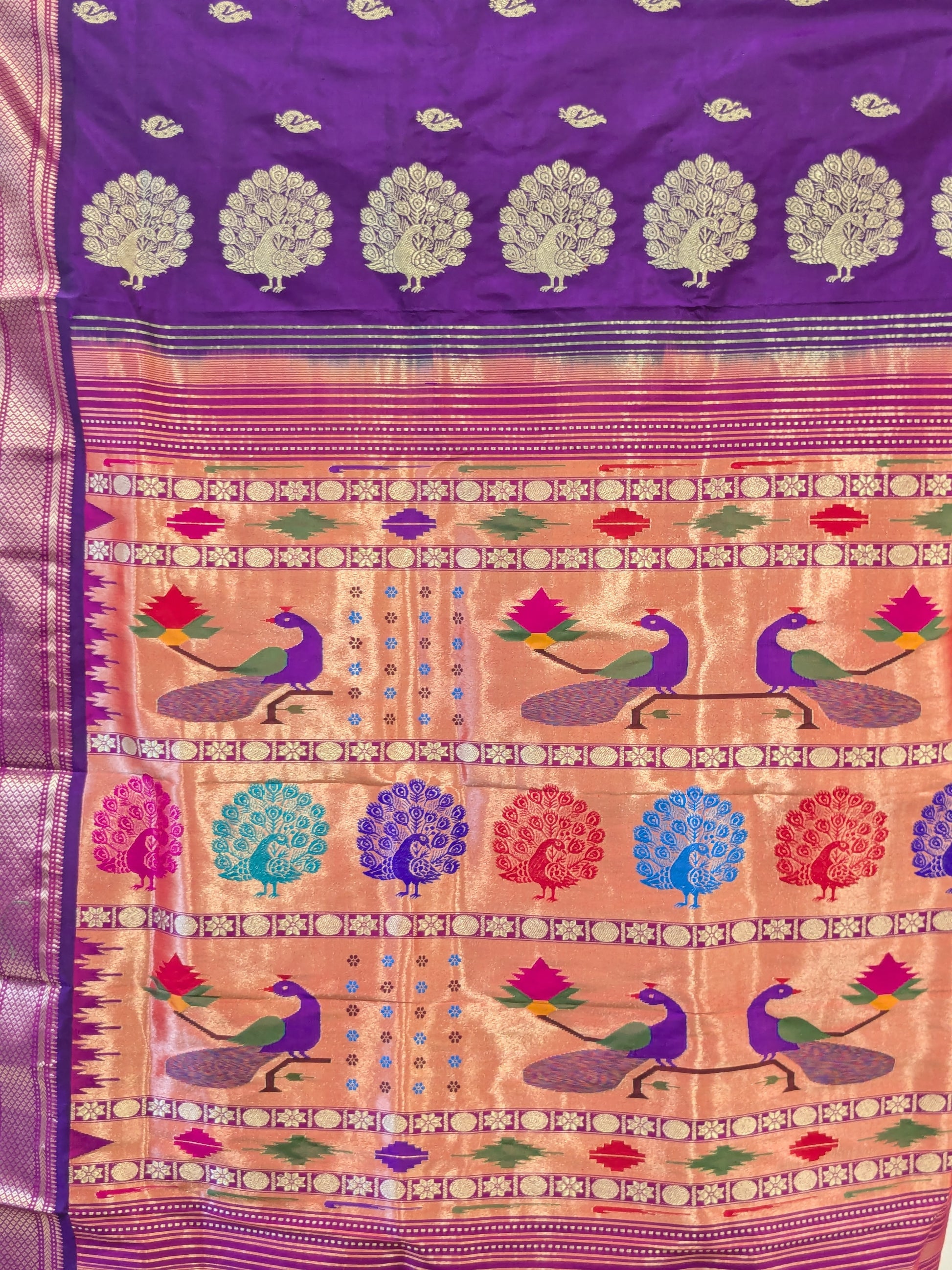 Detailed pallu featuring fancy peacock with meena work, a hallmark of Paithani craftsmanship.