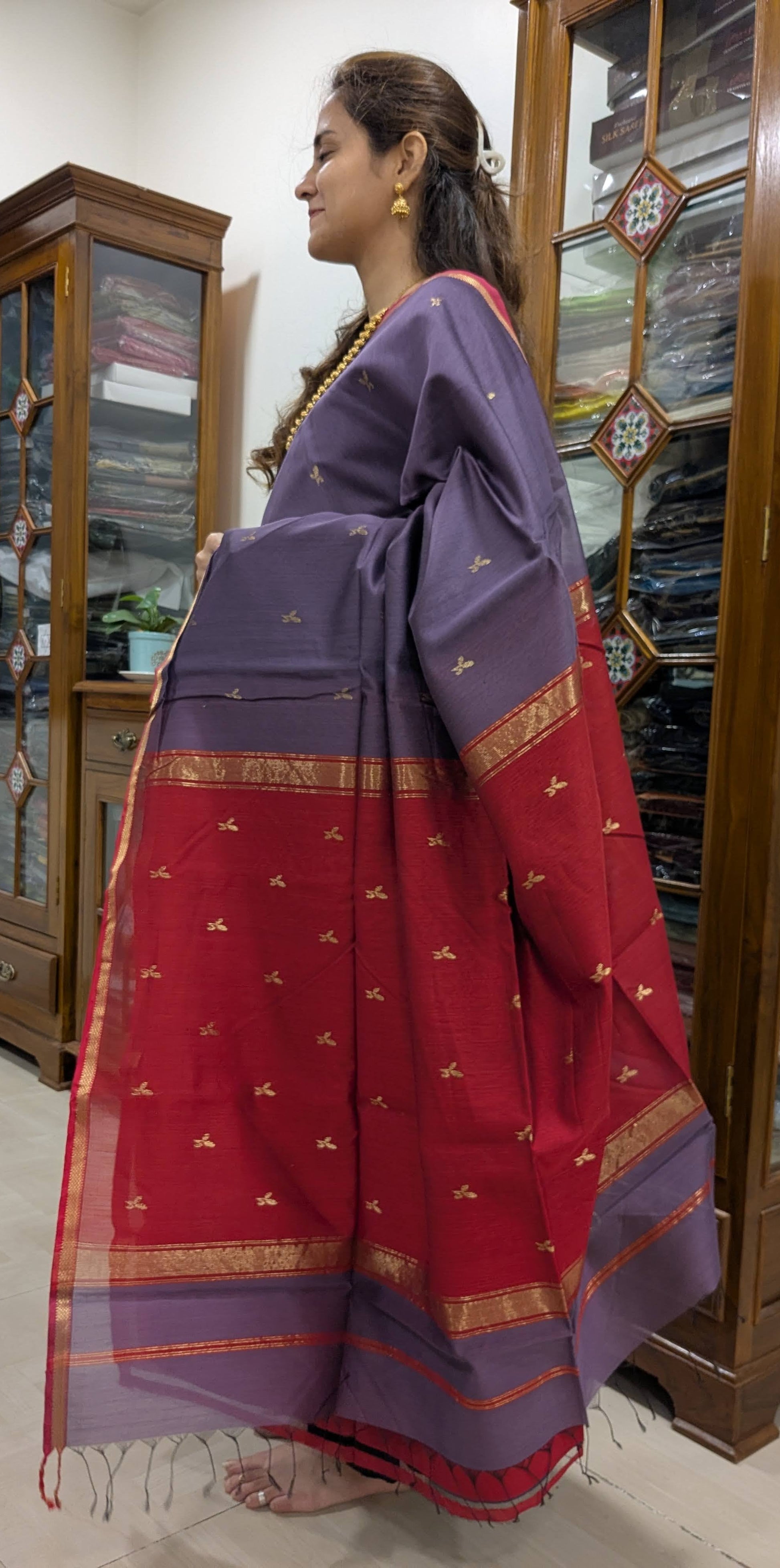 Side profile showcasing the lightweight silk-cotton drape and delicate leaf butti weave
