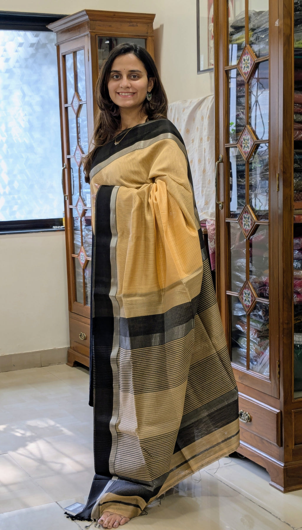 Maheshwari Light Orange Saree with Black Resham Border