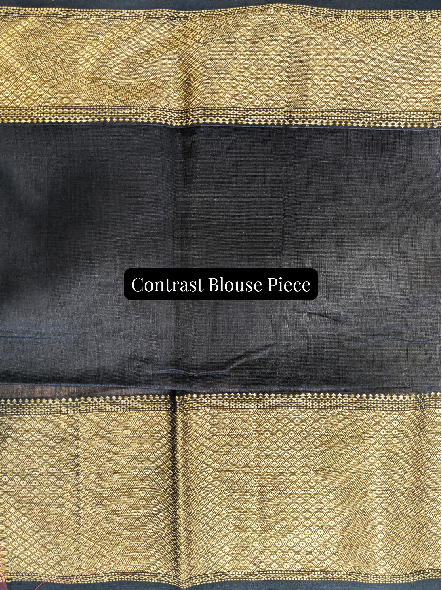 Black contrast blouse piece included to perfectly complement the grey saree body and ornate pallu.