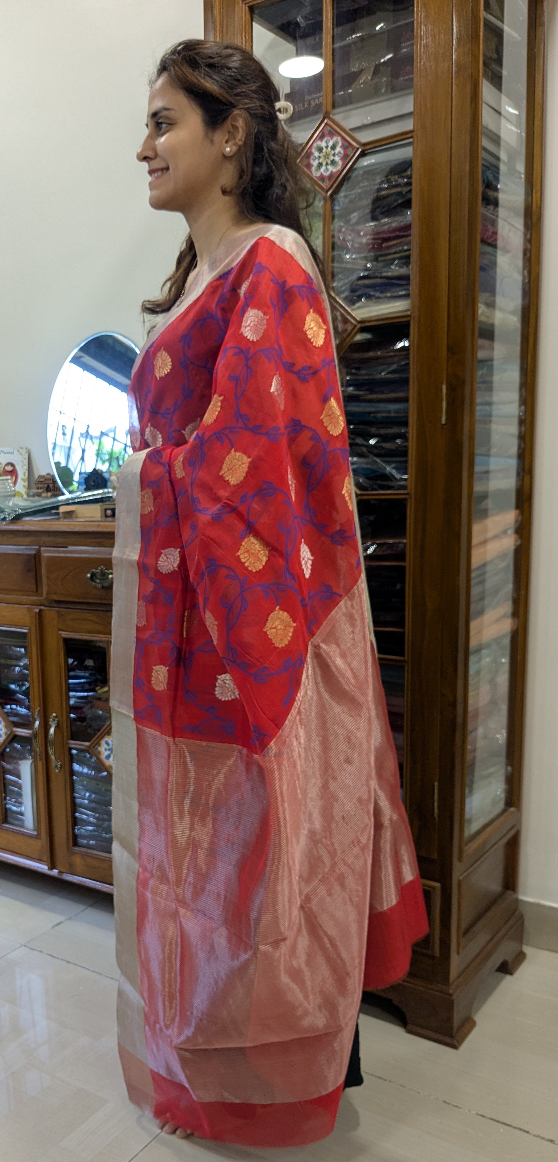 Side view highlighting the graceful drape and pure silk texture of this traditional weave.