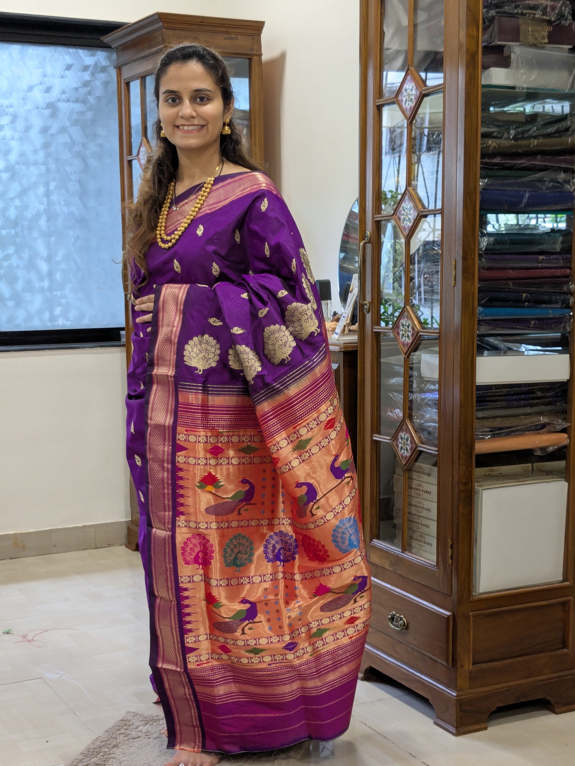 Full front view of bridal Paithani in rich purple showcasing luxurious handloom weave.