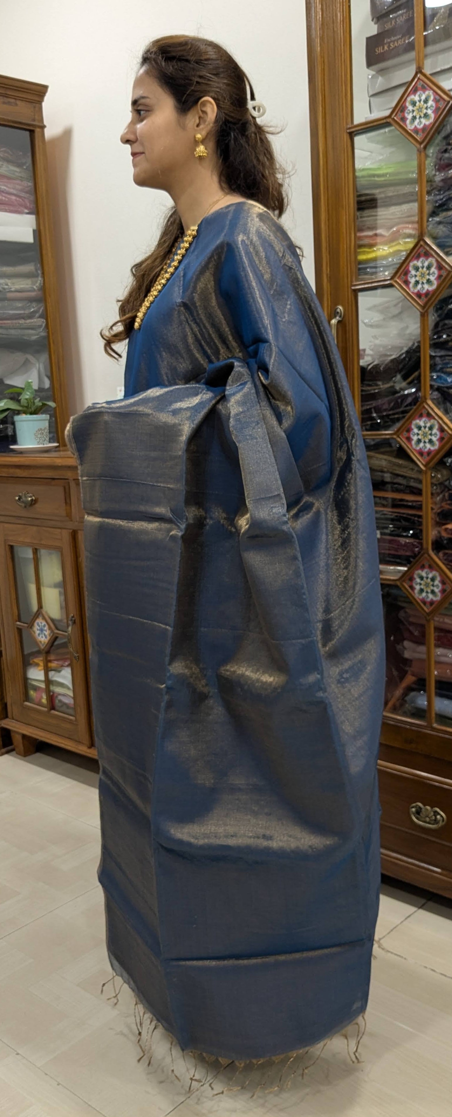 Side view revealing lightweight drape and sheer texture of the tissue-cotton fabric.