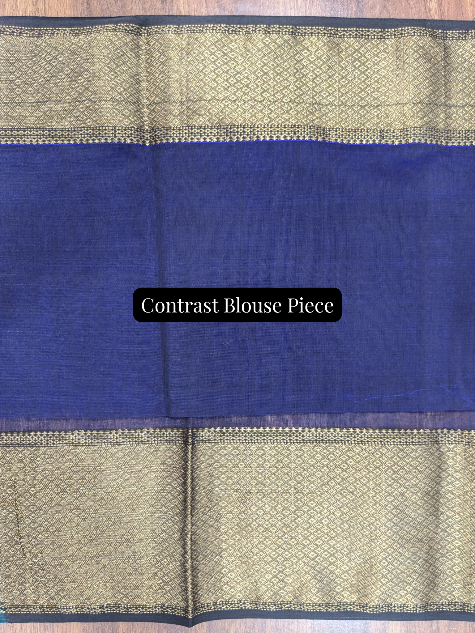 Dark blue contrast blouse piece included to enhance the festive elegance of the purple Maheshwari saree.