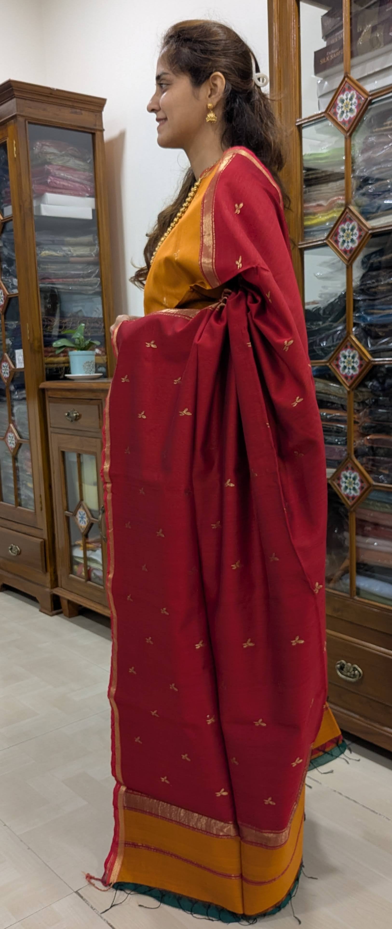 Side view showcasing the smooth drape and elegant texture of the mustard yellow weave.