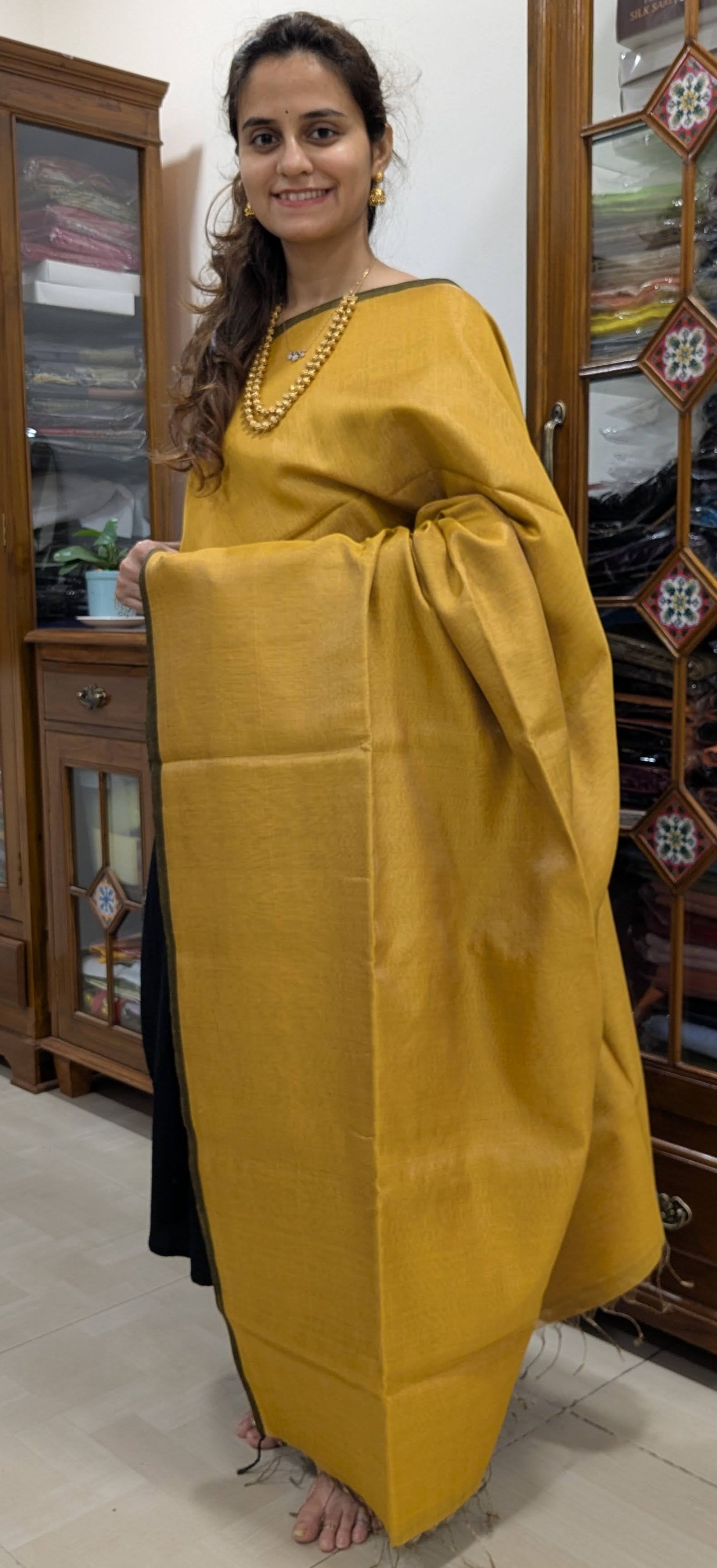 Full front view of lightweight yellow saree perfect for office or festive gatherings.