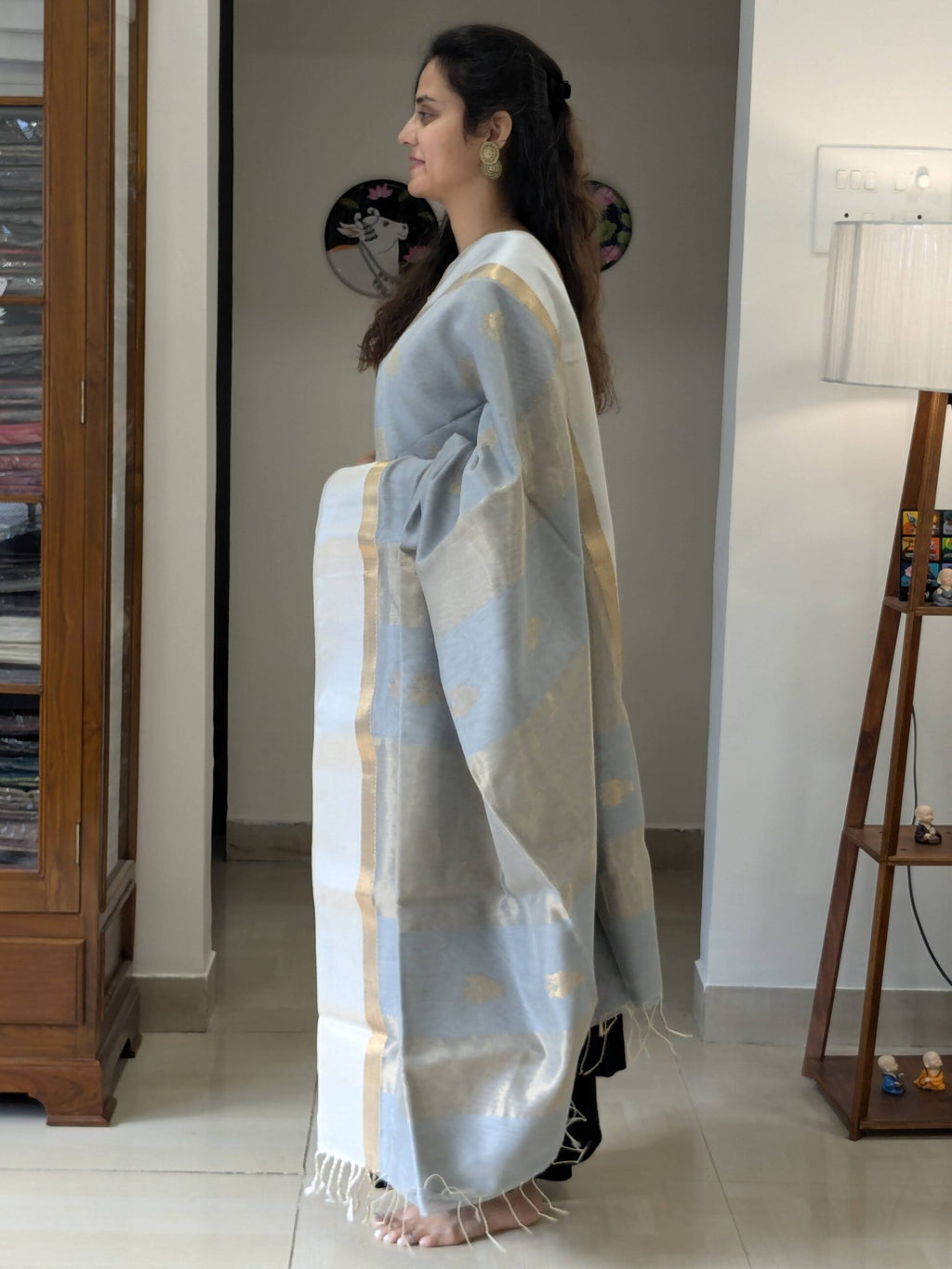 Side view of grey silk cotton saree showing soft drape, handwoven texture, and refined craftsmanship.