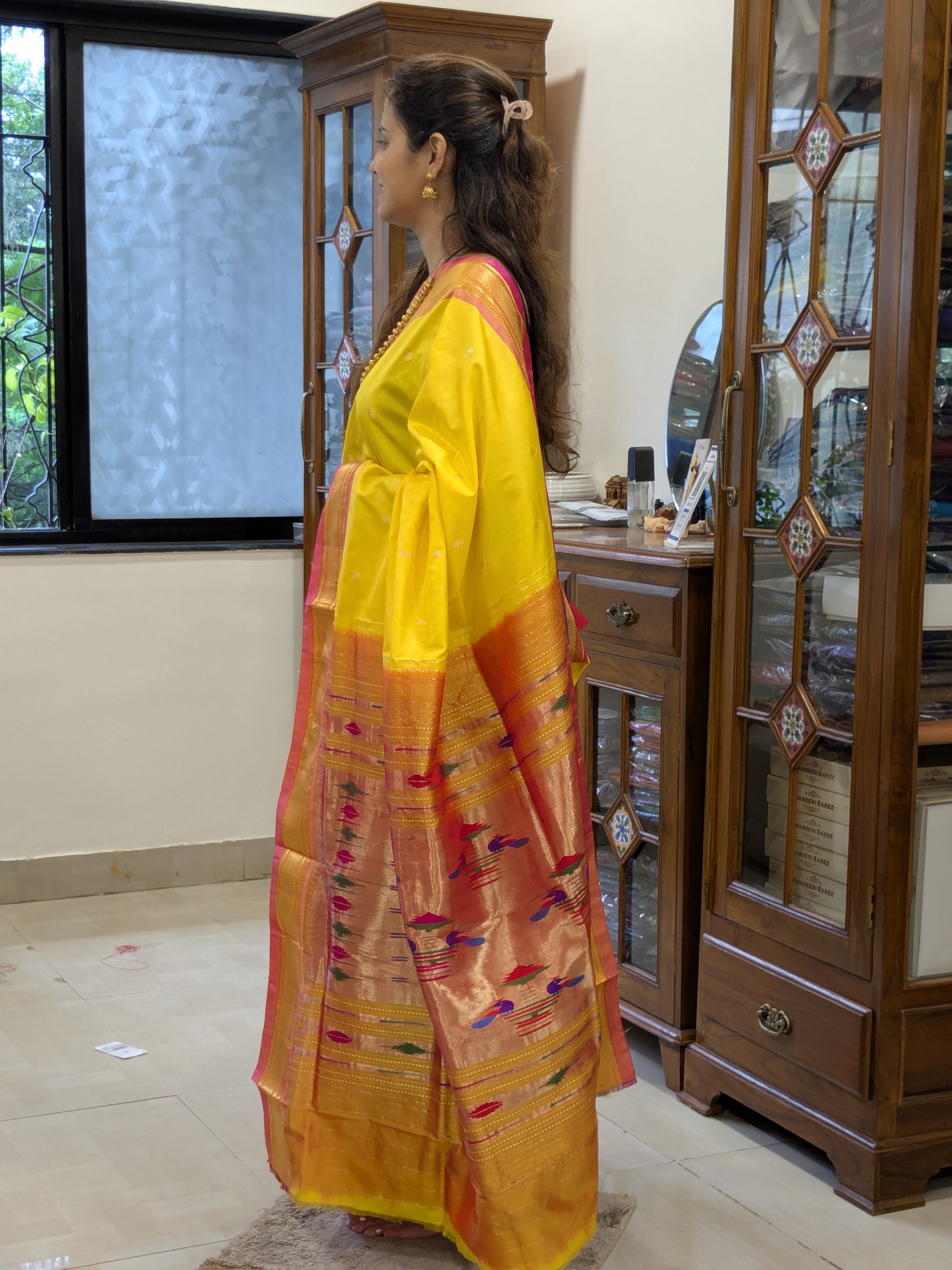 Side view revealing the smooth drape and richness of 100% pure silk weave.