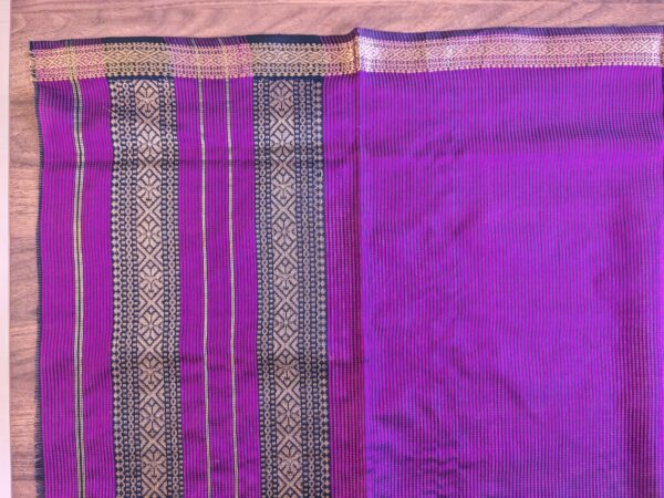 Detailed image of vintage-style pallu with subtle weaving details and timeless craftsmanship.