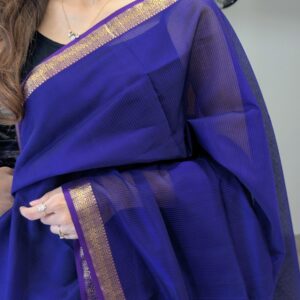 Close-up of purple Maheshwari saree with small checks
