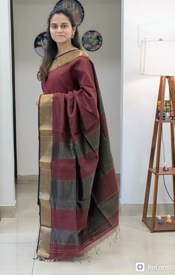 Full front view of festive maroon handloom Maheshwari saree featuring rich zari check pattern and traditional finish.