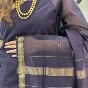 Close-up of black Maheshwari silk-cotton saree with linear design, small zari border