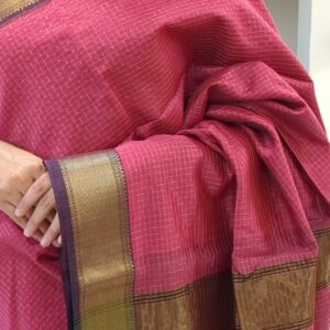 Close-up of onion pink Maheshwari silk-cotton saree with zari checks, medium border