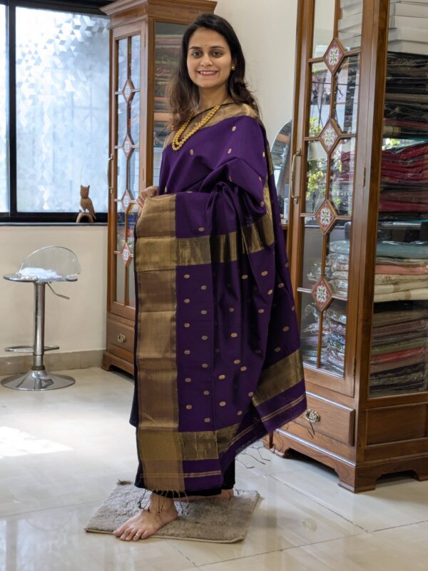 Full front view of festive and office-wear friendly purple Maheshwari saree with traditional floral motifs.